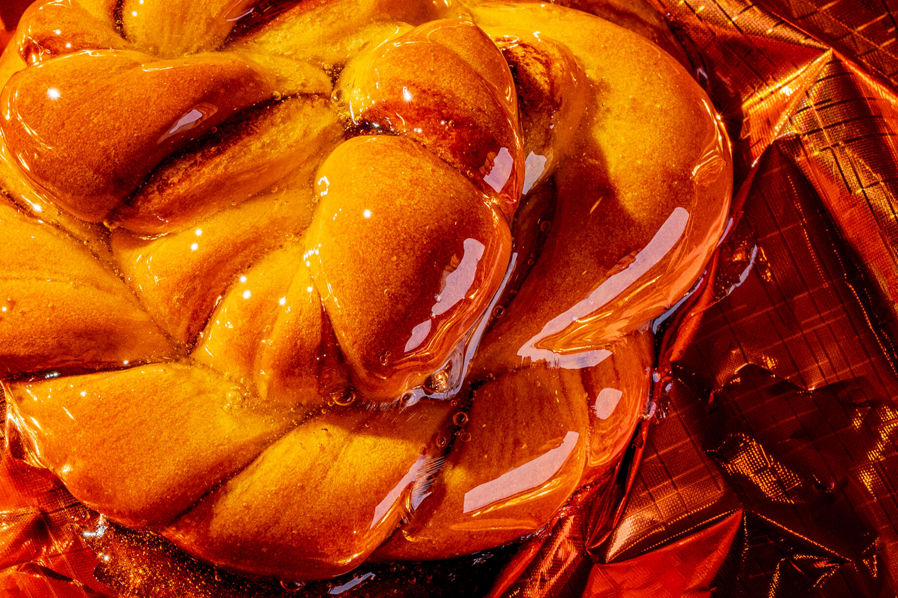 beautiful cardamom bun glazed in shiny syrup